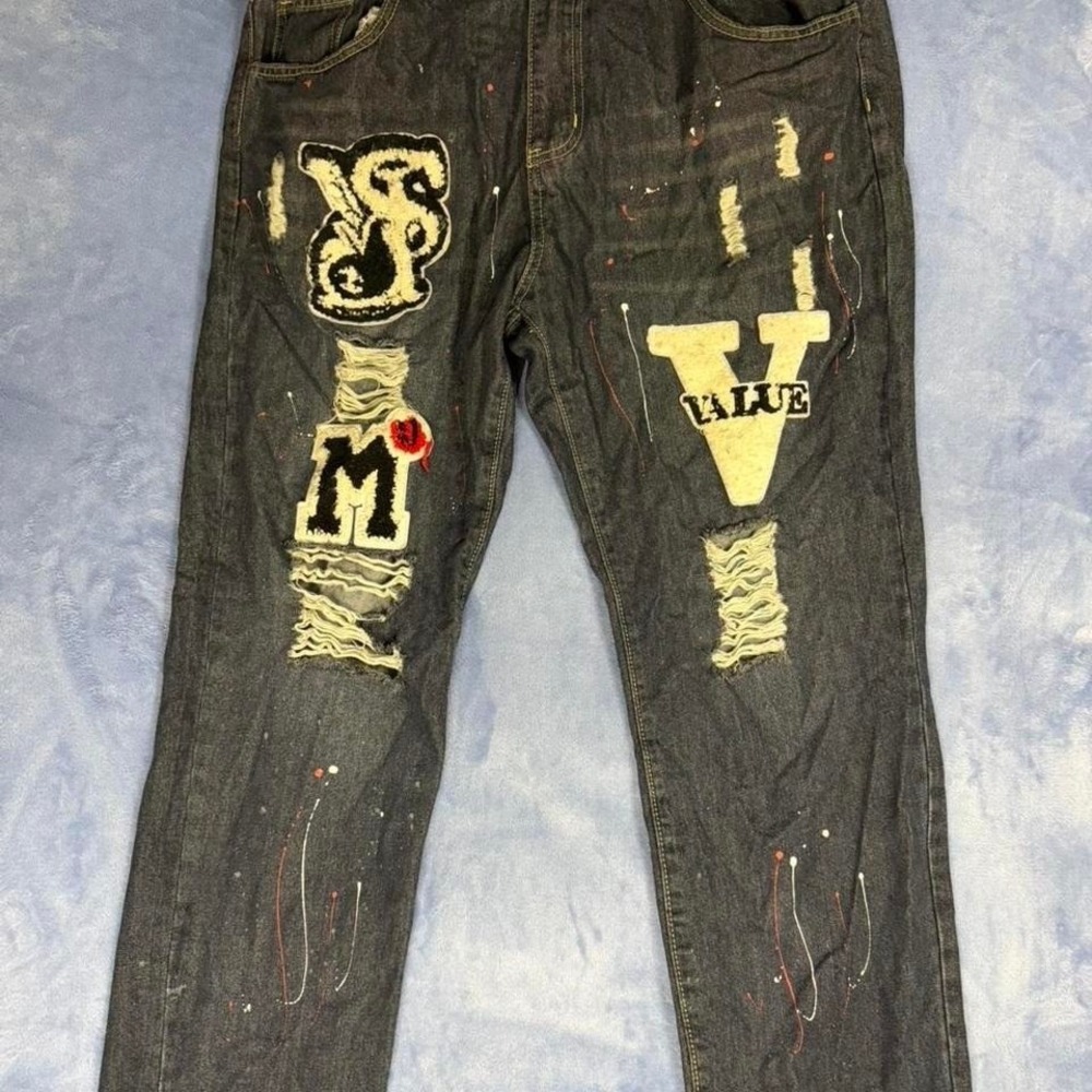 Distressed black denim jeans with paint splatter and embroidery, Size: 38‎